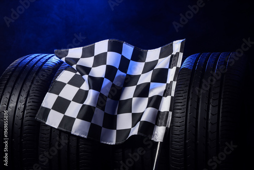Racing flag with car tires ...