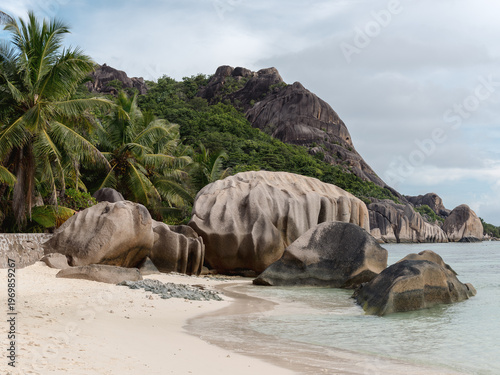 Anse Source d'Argent at sunny summer day - beautiful and tropical coast in Indian ocean, Seychelles island