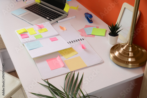 Notebooks with sticky notes...