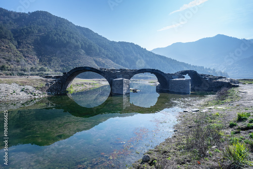 Wallpaper Mural Ancient Stone Arch Bridge Ruins in Wuyuan Torontodigital.ca