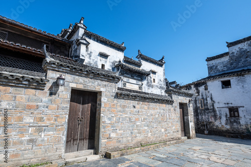 Wallpaper Mural Traditional Huizhou Architecture in Ancient Village with White Walls, Grey Tiles and Stone Courtyard Torontodigital.ca