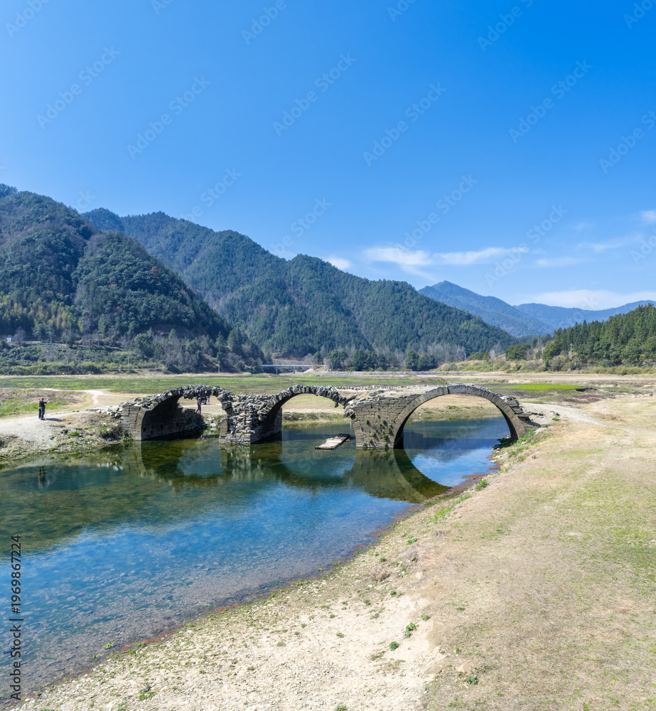 custom made wallpaper toronto digitalAncient Stone Arch Bridge Spanning a Clear River