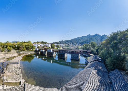 Wallpaper Mural Traditional Chinese Covered Bridge Spanning a Serene River in Wuyuan Torontodigital.ca