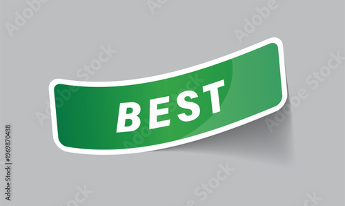 green rectangular sticker with best text and curled corner effect on grey background