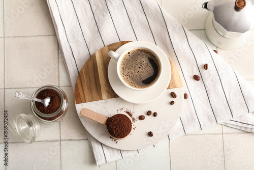 Cup of hot coffee and woode...