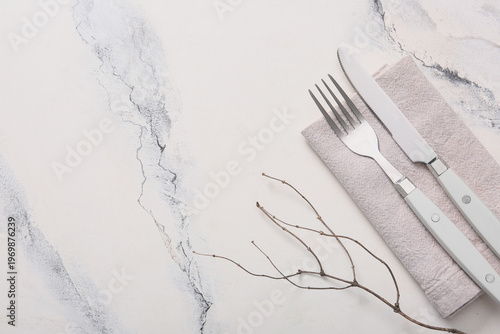 Silver cutlery with napkin ...