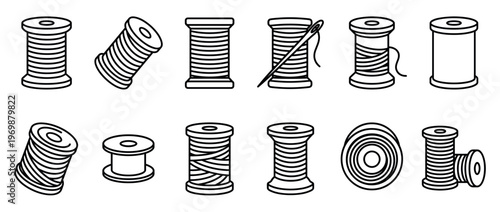 Collection of various thread spools and bobbins, some with thread and a needle, representing sewing and tailoring supplies.
