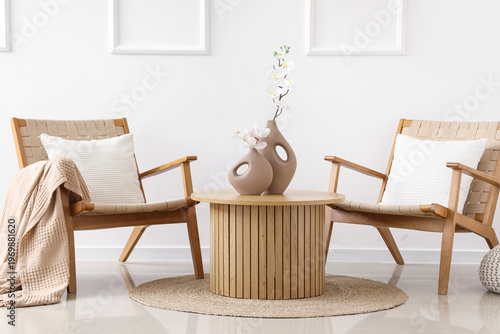 Wicker armchairs, table and...