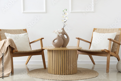 Wicker armchairs, table and...
