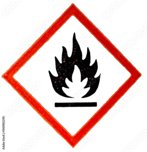 Symbole de danger d'incendie avec flamme noire dans un losange rouge.