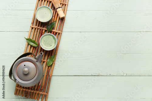 Bamboo mat with cups of fre...