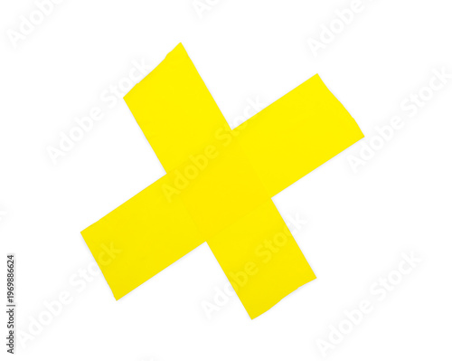 Cross made of yellow adhesi...