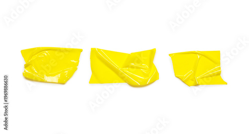 Crumpled strips of yellow a...