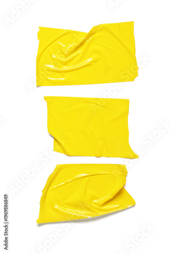 Crumpled strips of yellow a...