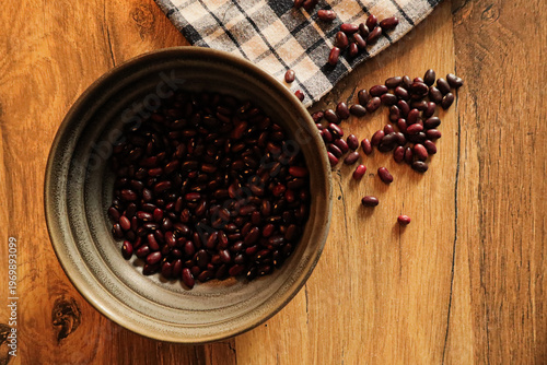 Photos A deep, dark bowl filled halfway with dry beans