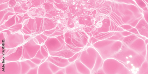 A vibrant and abstract view of bright pink water ripples captured in a high resolution close up.