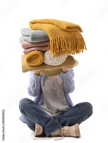 Young woman with stack of c...