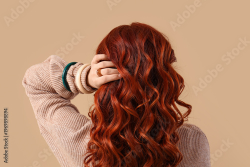Beautiful young redhead wom...