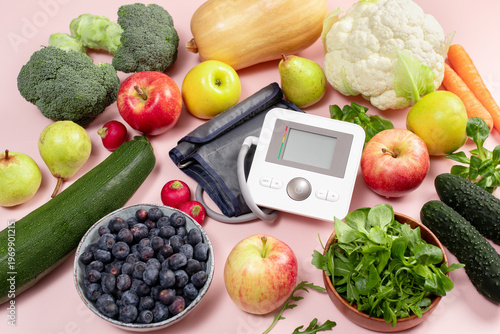 Healthy food and blood pressure monitor, hypertension prevention, DASH diet, heart health, cardiovascular wellness