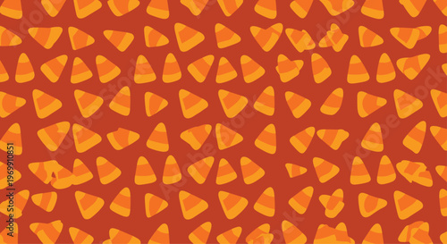 Seamless pattern of candy corn features a repetitive display of the classic orange, yellow, and white triangular halloween sweets.