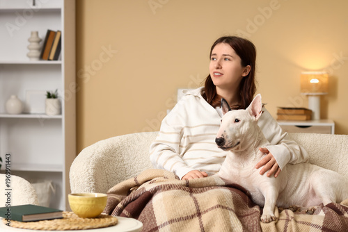 Young woman with cute Bull ...