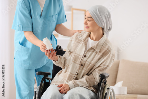 Young woman in wheelchair a...