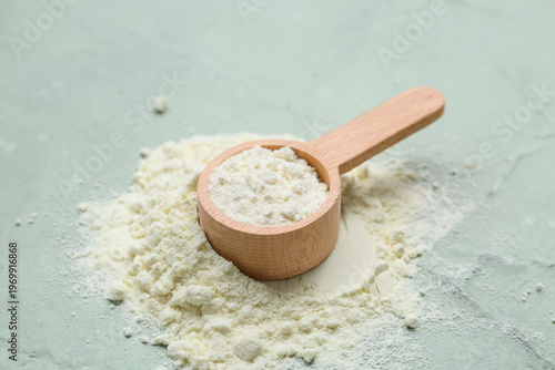 Measuring scoop with powder...