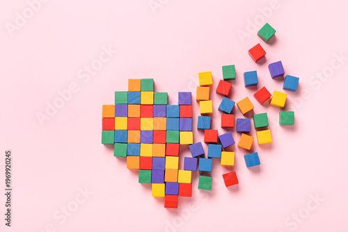 Heart made of colorful buil...