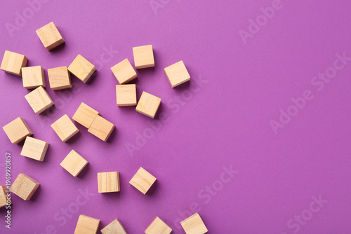 Wooden building cubes on pu...