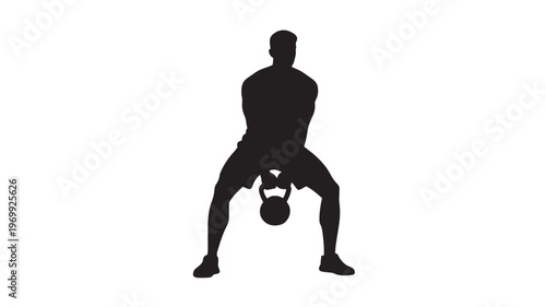 Silhouette of a Muscular Male Athlete Performing a Kettlebell Sumo Squat or Swing