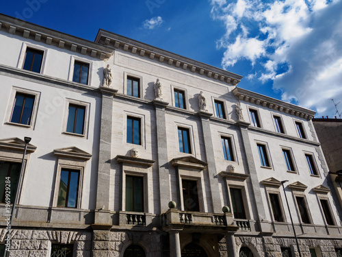 Old residential building along Via Caradosso in Milan, Italy