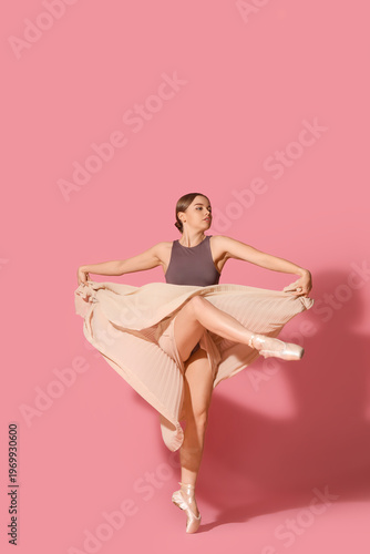 Young ballerina in skirt da...