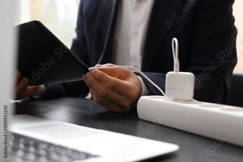 Businessman connecting char...