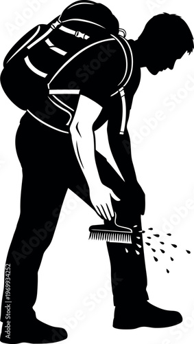 Silhouette of a person urinating man relieving himself