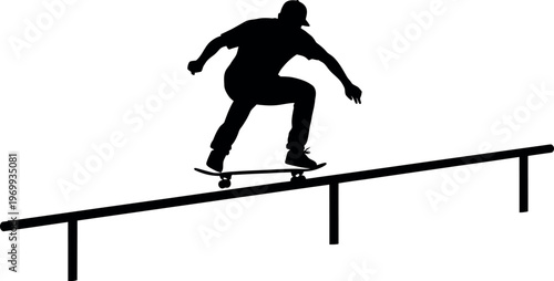 Silhouette of a skateboarder performing a trick on a rail