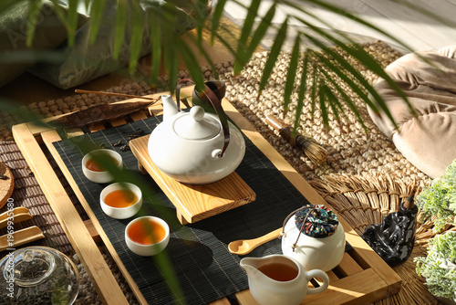 Tray with Asian tea set on ...