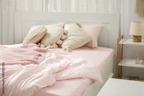 Interior of light bedroom w...