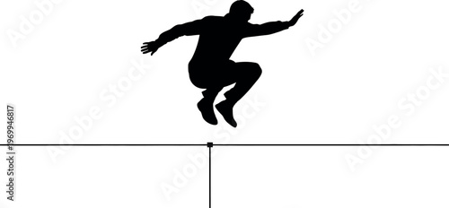 Silhouette of a person jumping over a line