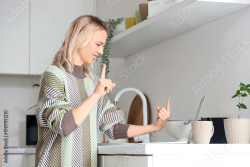 Mature mute woman using sig...