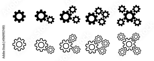 Different sizes of gears align and connect in a playful arrangement. Each gear turns gracefully, indicating the beauty of mechanical efficiency and teamwork in motion