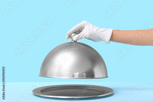 Female hand with metal silv...