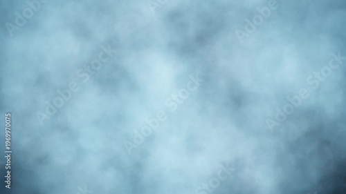 A soft blue cloudy texture with smooth gradients and subtle haze. The gentle, diffused look creates a calm and atmospheric background ideal for minimal design, video overlays, and serene visual projec