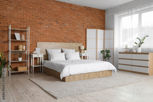 Interior of light bedroom w...