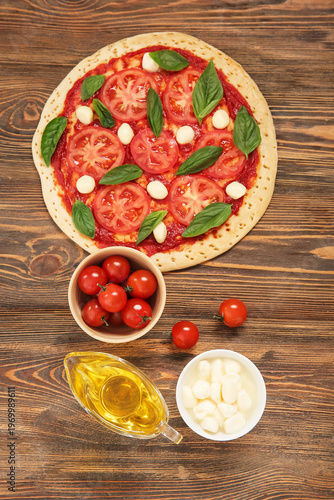 Tasty pizza and ingredients...