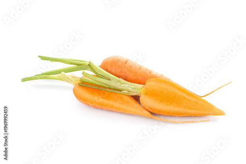 Fresh carrot and halves on ...