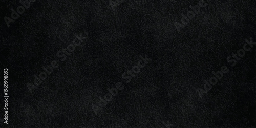 black textured stone background with subtle grain, elegant dark slate or charcoal concrete surface for backdrop