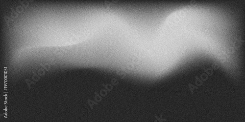 Abstract monochrome blurred flowing light with soft gradients on dark background, smooth defocused glow texture for minimal modern creative design and artistic backdrop