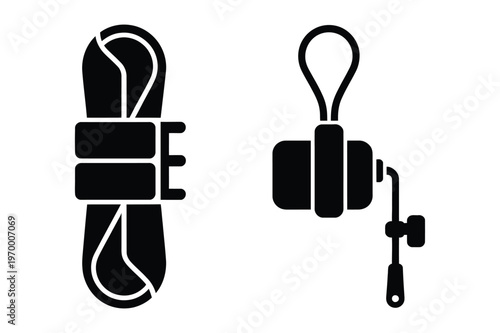 Black silhouette of coiled rope and a winch mechanism