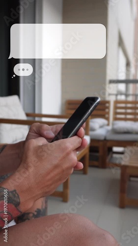 Typing on smartphone with animated chat bubbles overlay. Online messaging concept, close-up hands using mobile phone, social media communication. Vertical video with copy space 9:16.