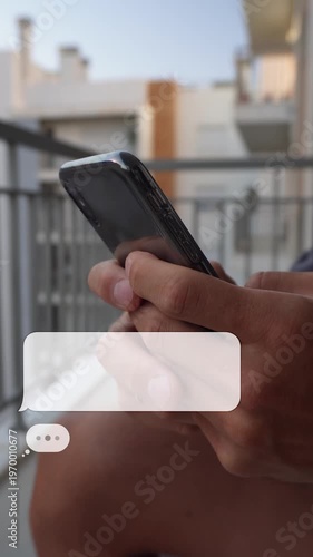Typing on smartphone with animated chat bubbles overlay. Online messaging concept, close-up hands using mobile phone, social media communication. Vertical video with copy space 9:16.